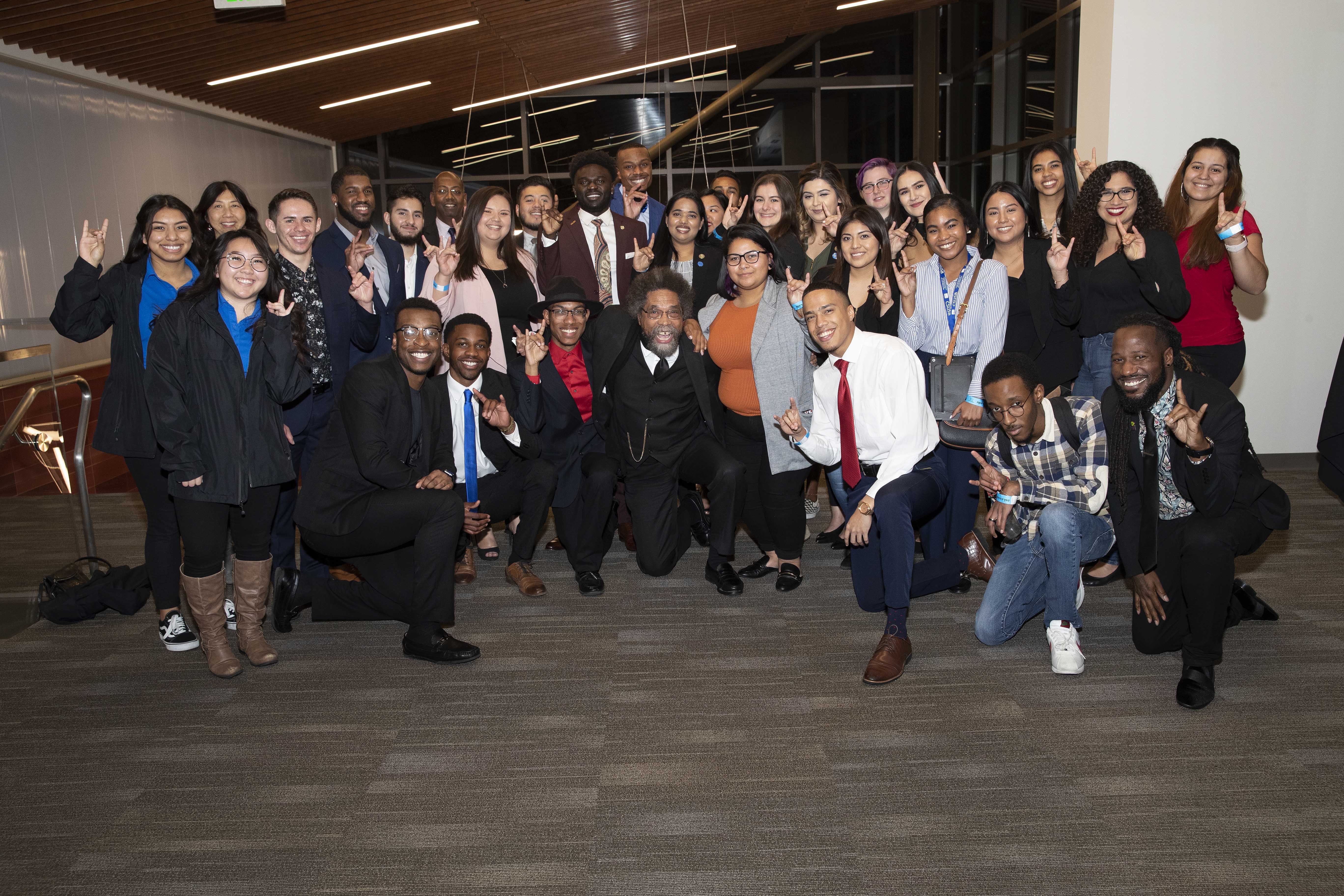 Cornel West, center, with CSUSB students, Jan. 25, 2019.
