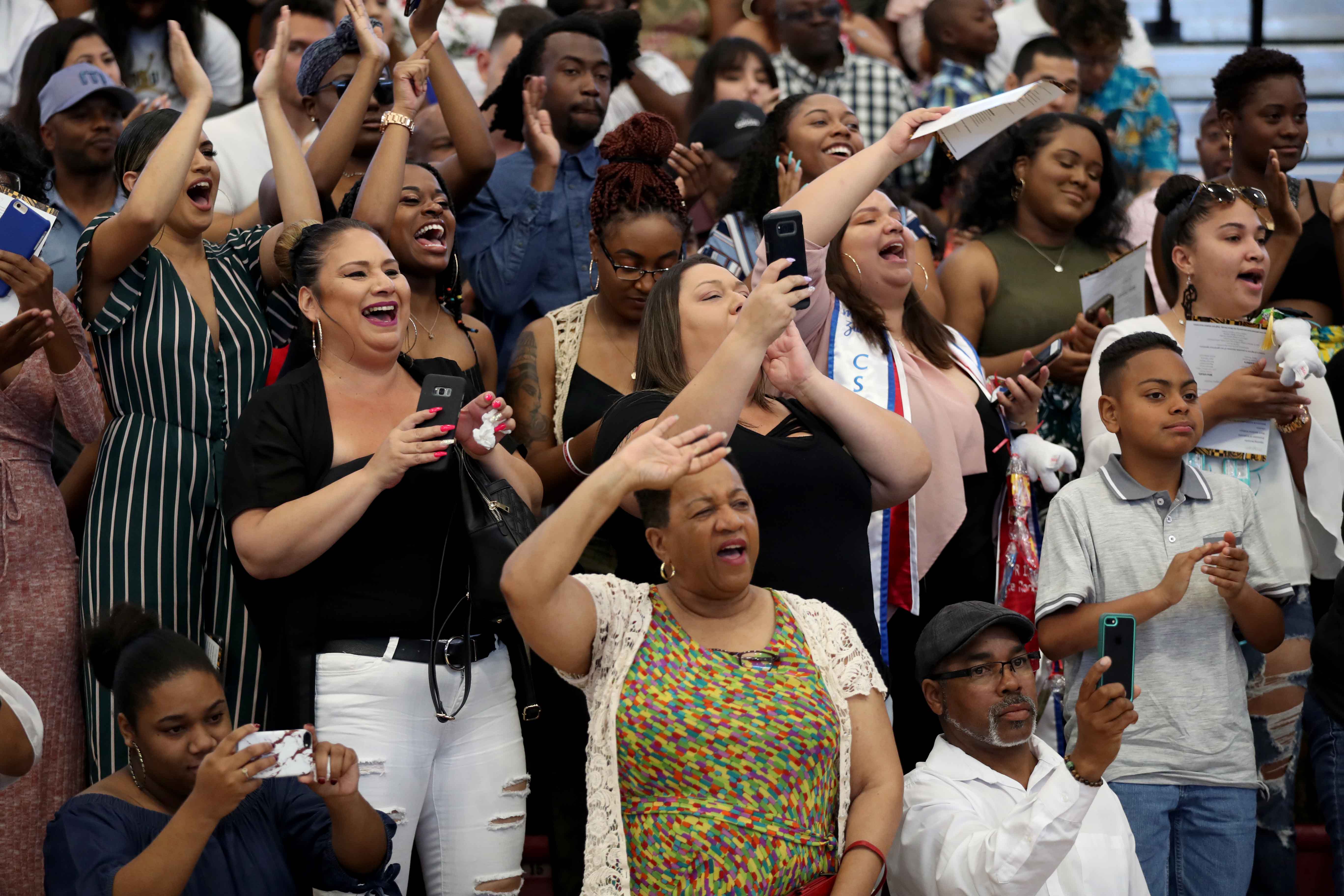 About 2,000 family, friends and supporters were at the arena to celebrate with the students.