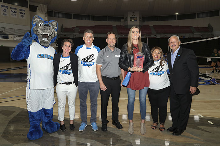 Former Coyote volleyball standout Samantha Middleborn (third from the right) was inducted into the CCAA Hall of Fame during the CSUSB-Cal Poly Pomona match.