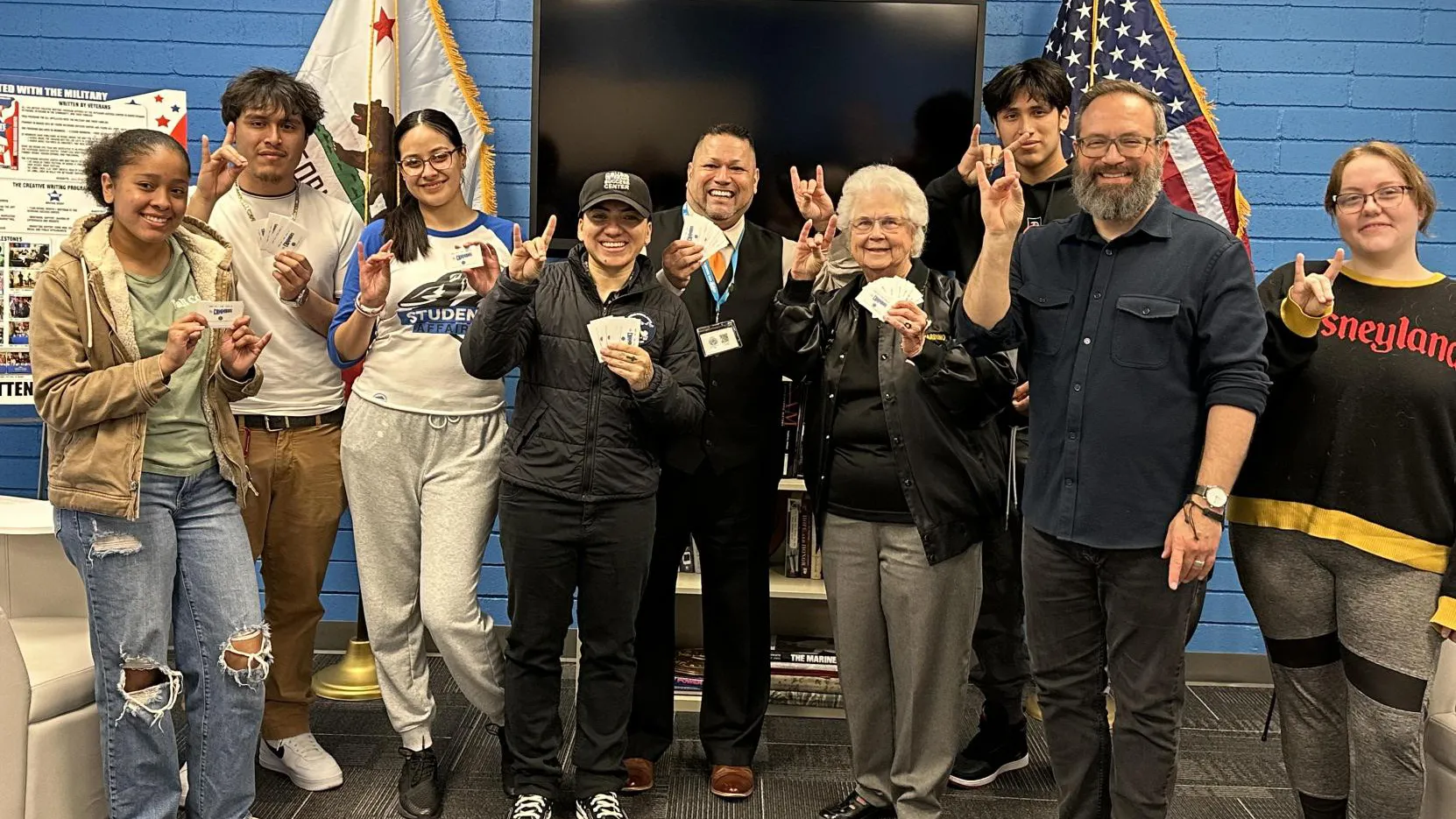 Beth Alexander (fourth from the right) visits the CSUSB Veterans Success Center. The longtime supporter of the center passed away on May 21.